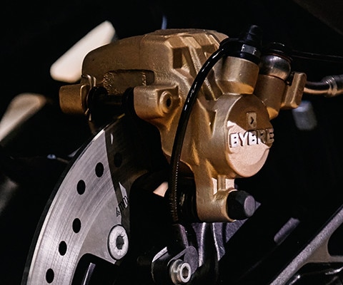 Pinças de freio douradas da G 310 GS